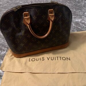 Vintage Louis Vuitton Alma top handle bag. Used preloved.